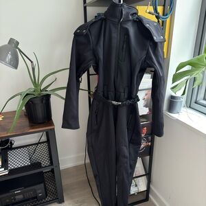 Brand new ASOS ski suit - size 2 petite 5’3” or shorter. Never used.